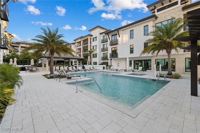 pool with a patio area