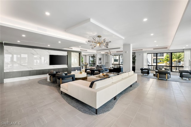 living room featuring light tile patterned floors, recessed lighting, and a notable chandelier