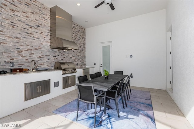 interior space with ceiling fan and sink