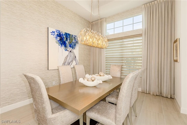 dining room with a chandelier