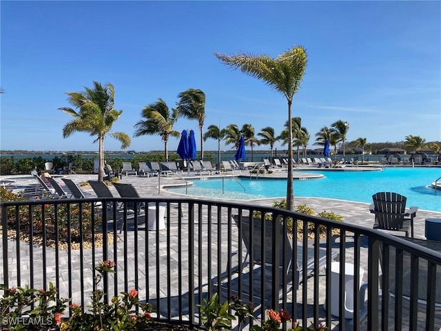 view of swimming pool with a patio