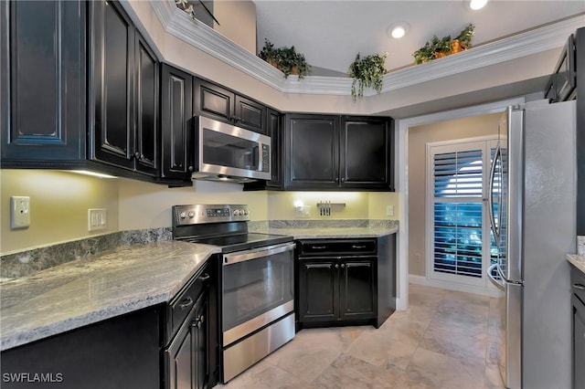 kitchen with light stone countertops, stainless steel appliances, crown molding, and lofted ceiling