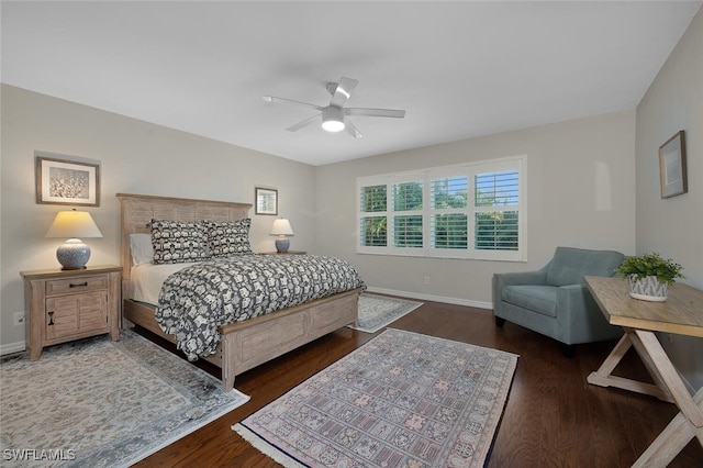 bedroom featuring ceiling fan and dark hardwood / wood-style floors