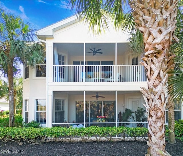 back of house featuring ceiling fan