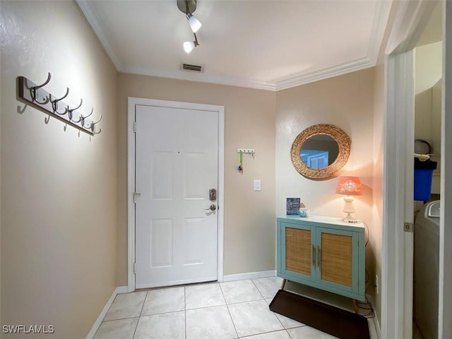11921 Seabreeze Cove Ln Unit 202, Fort Myers, FL 33908 - foyer entrance with ornamental molding, baseboards, and light tile patterned floors