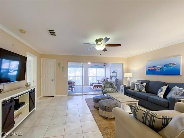 11921 Seabreeze Cove Ln Unit 202, Fort Myers, FL 33908 - living room featuring crown molding, light tile patterned flooring, a ceiling fan, and baseboards