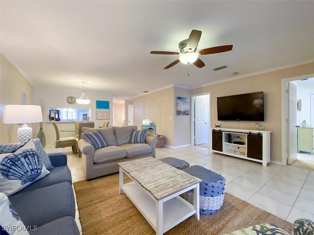 11921 Seabreeze Cove Ln Unit 202, Fort Myers, FL 33908 - living area featuring ceiling fan, light tile patterned floors, baseboards, and ornamental molding