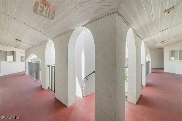 11921 Seabreeze Cove Ln Unit 202, Fort Myers, FL 33908 - corridor with arched walkways