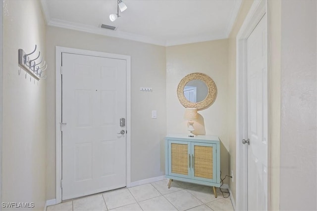 11921 Seabreeze Cove Ln Unit 202, Fort Myers, FL 33908 - foyer with crown molding and light tile patterned floors