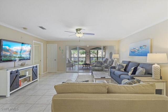 11921 Seabreeze Cove Ln Unit 202, Fort Myers, FL 33908 - living room featuring light tile patterned floors, crown molding, and a ceiling fan