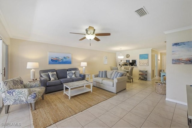 11921 Seabreeze Cove Ln Unit 202, Fort Myers, FL 33908 - living room featuring light tile patterned flooring, ceiling fan, and crown molding