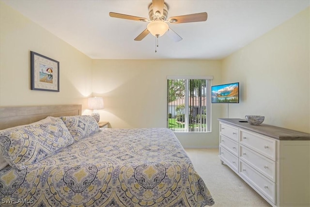 11921 Seabreeze Cove Ln Unit 202, Fort Myers, FL 33908 - bedroom with light carpet and ceiling fan