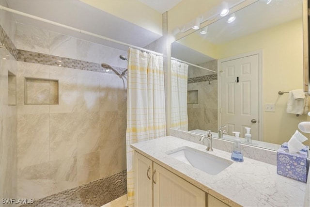 11921 Seabreeze Cove Ln Unit 202, Fort Myers, FL 33908 - bathroom with tiled shower and vanity