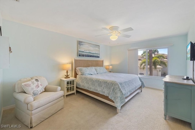 11921 Seabreeze Cove Ln Unit 202, Fort Myers, FL 33908 - bedroom featuring ceiling fan and light colored carpet