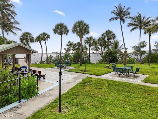 11921 Seabreeze Cove Ln Unit 202, Fort Myers, FL 33908 - view of property's community featuring a lawn and a gazebo