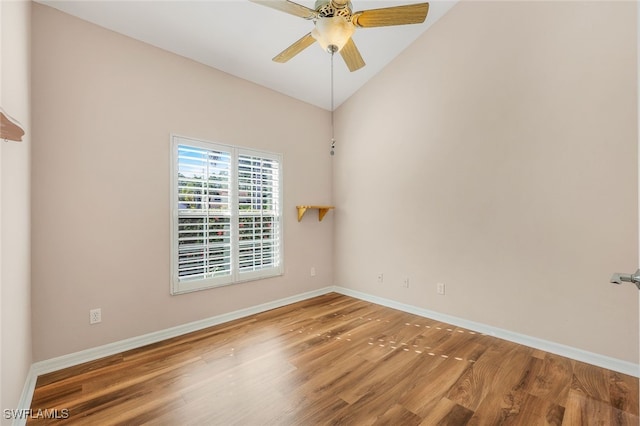 unfurnished room featuring ceiling fan, wood-type flooring, and vaulted ceiling