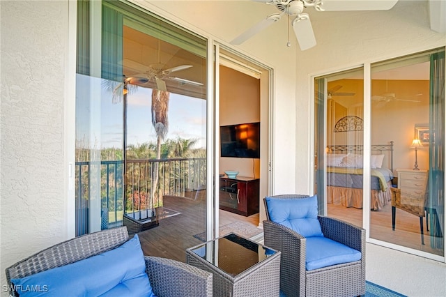 balcony featuring ceiling fan