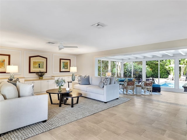 living room featuring ceiling fan