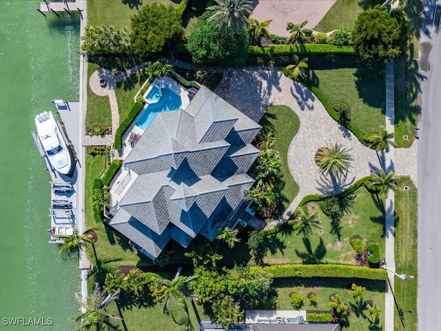 birds eye view of property featuring a water view