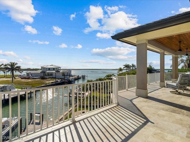 balcony featuring a water view