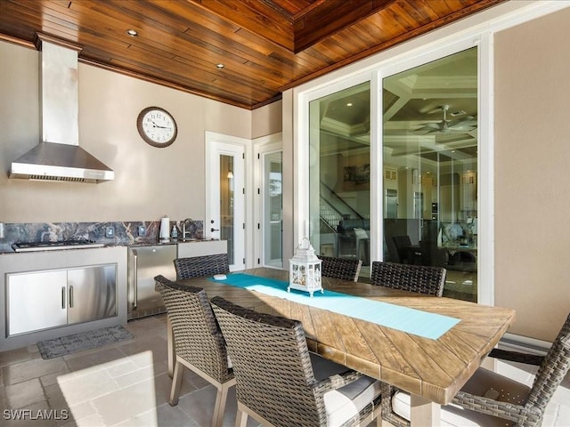 view of patio with exterior kitchen and sink