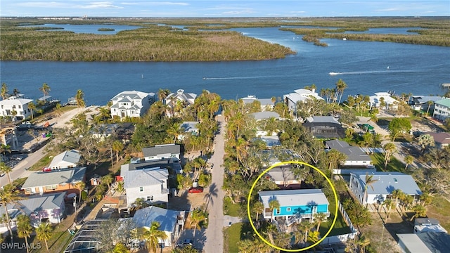 aerial view featuring a water view and a residential view