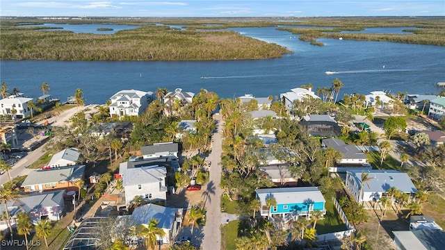 aerial view with a residential view and a water view