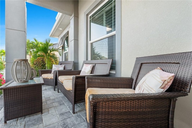 balcony featuring a patio and an outdoor hangout area