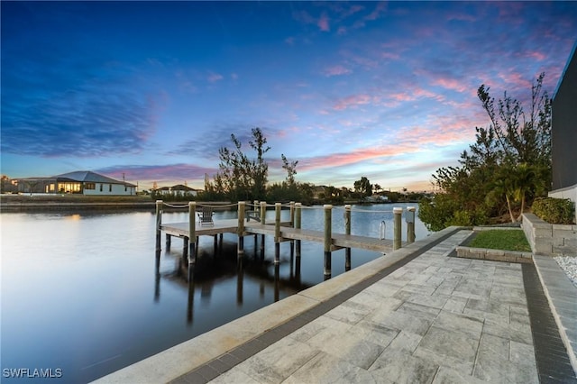 dock area featuring a water view