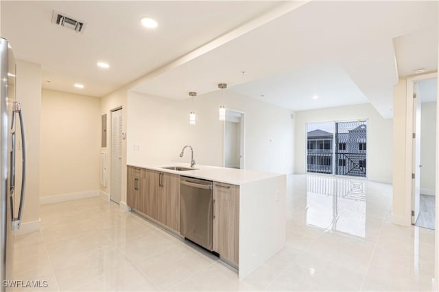 26610 Rosewood Pointe Dr Unit 308, Bonita Springs, FL 34135 - kitchen with sink, decorative light fixtures, light tile patterned floors, and appliances with stainless steel finishes