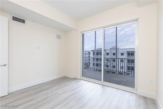 26610 Rosewood Pointe Dr Unit 308, Bonita Springs, FL 34135 - unfurnished room featuring light wood-type flooring