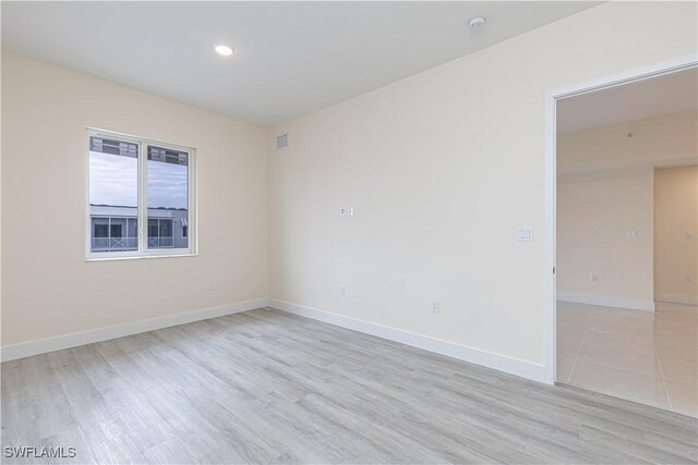 26610 Rosewood Pointe Dr Unit 308, Bonita Springs, FL 34135 - unfurnished room featuring light hardwood / wood-style floors