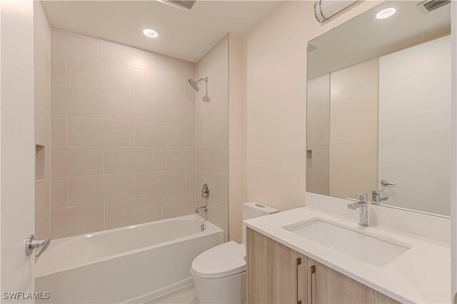 26610 Rosewood Pointe Dr Unit 308, Bonita Springs, FL 34135 - full bathroom with toilet, vanity, and tiled shower / bath