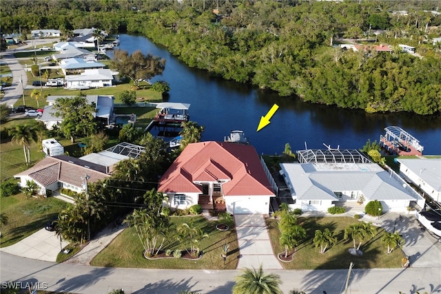 birds eye view of property featuring a water view