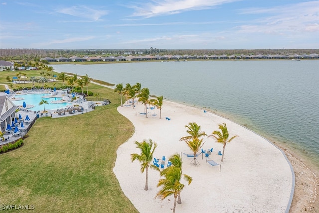 aerial view featuring a water view and a beach view