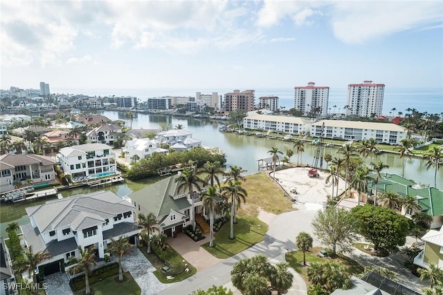 birds eye view of property featuring a water view