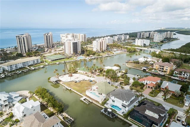 birds eye view of property featuring a water view