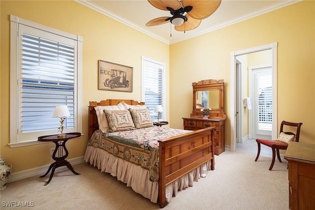 bedroom with baseboards, ceiling fan, ornamental molding, and light colored carpet