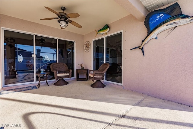 view of patio with ceiling fan