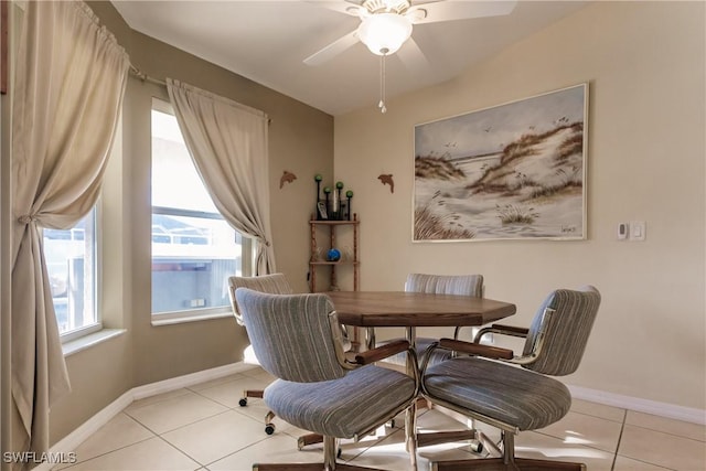 dining room featuring light tile patterned floors and ceiling fan