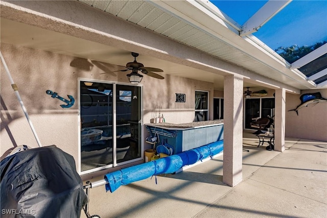 view of patio with ceiling fan