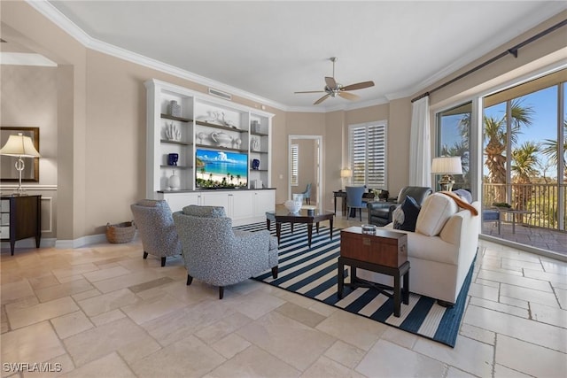 living room with crown molding and ceiling fan