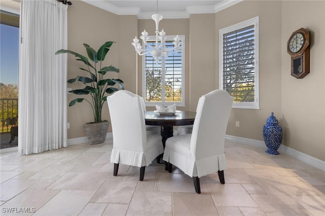 dining space with crown molding and a notable chandelier