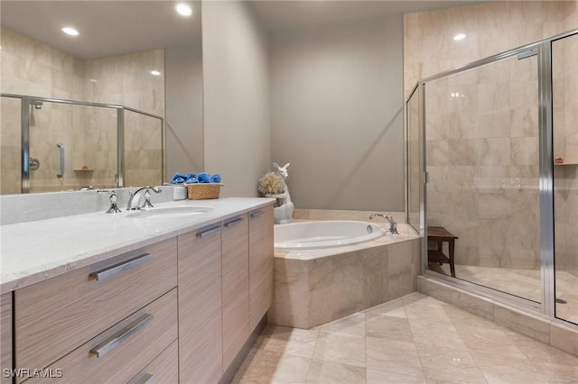 bathroom featuring independent shower and bath and vanity