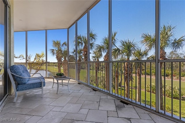 unfurnished sunroom with a healthy amount of sunlight