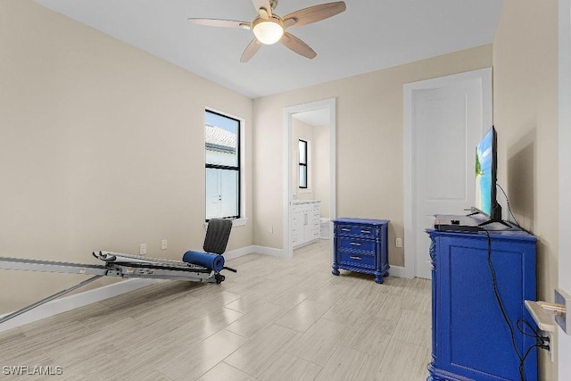 workout room with ceiling fan