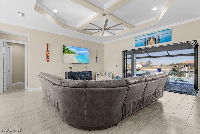 living room featuring beamed ceiling, crown molding, ceiling fan, and coffered ceiling