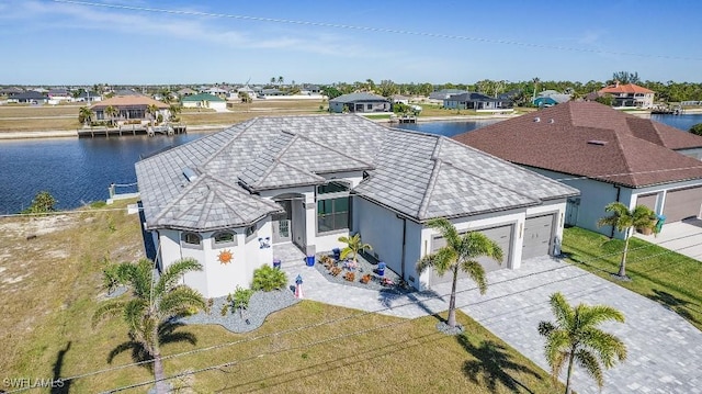 drone / aerial view featuring a water view