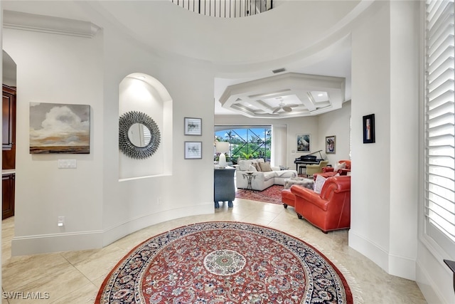 hall with beam ceiling, crown molding, and coffered ceiling