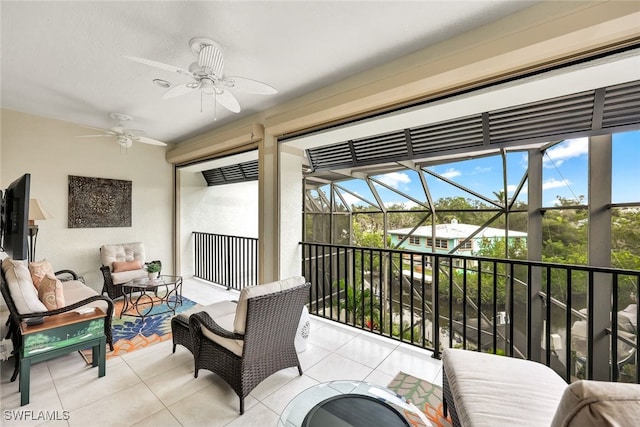 sunroom / solarium with ceiling fan